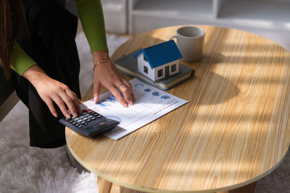 homeowner calculating mortgage based consolidation